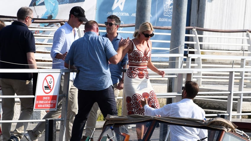 Jared Kushner and Ivanka Trump get into a water taxi in Venice, Italy