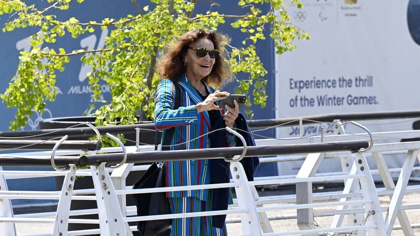 Diane Von Furstenberg wears a striped suit in Venice