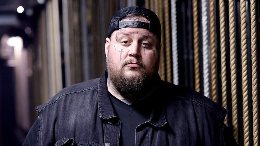 jelly roll embraces role in country music revolution after overcoming addiction and prison time
