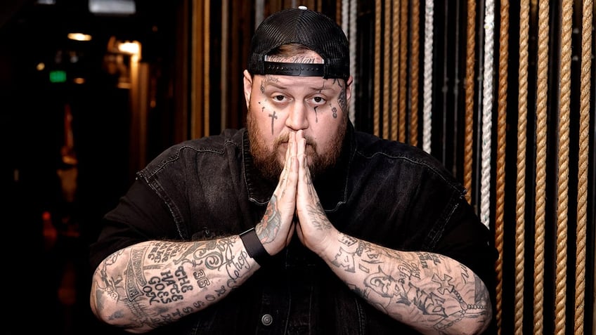 jelly roll embraces role in country music revolution after overcoming addiction and prison time