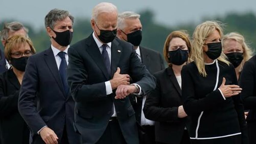 jen psaki claims biden never looked at watch suggests gold star parents lied