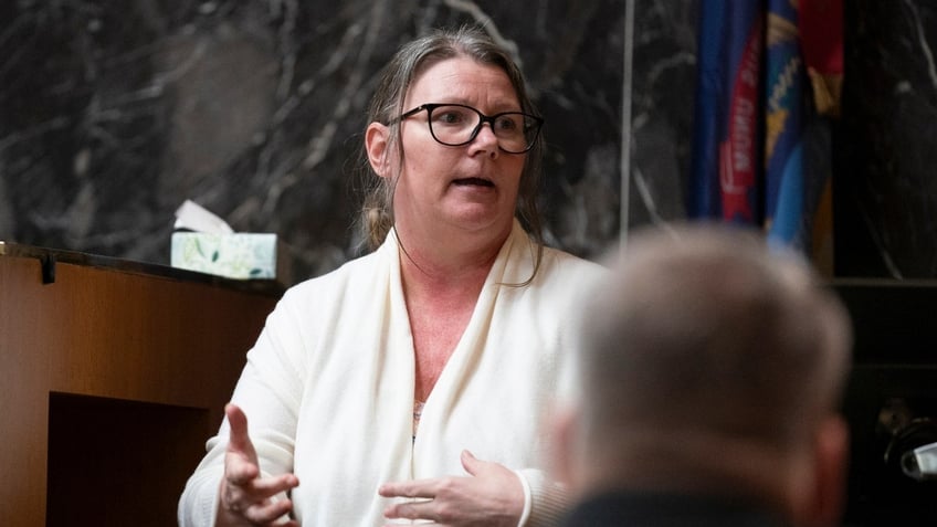 Jennifer Crumbley looks at the jury while she answers her attorney as she takes the stand in the Oakland County courtroom, on Thursday, Feb. 1, 2024, in Pontiac, Mich.