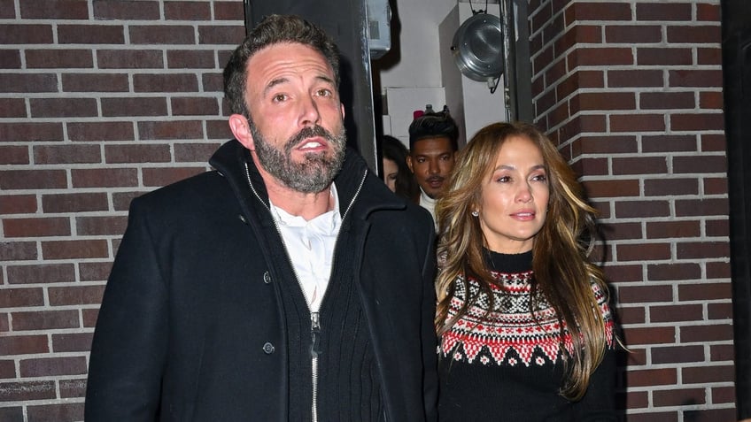 Ben Affleck and Jennifer Lopez are caught by cameras as they leave a Broadway show.