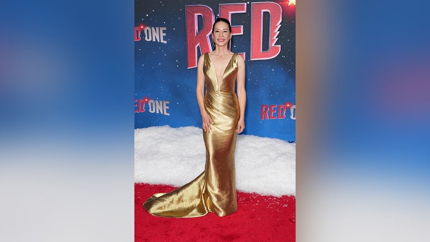 Lucy Liu wore a gold Marchesa gown to the premiere of "Red One."