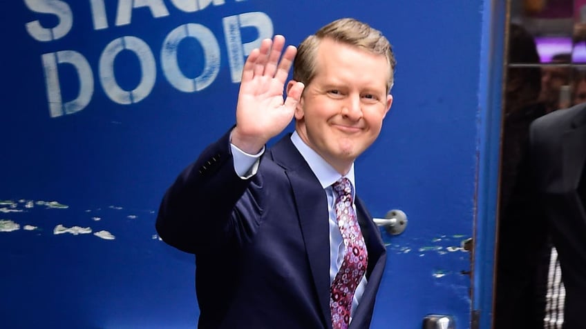 A photo of Ken Jennings waving