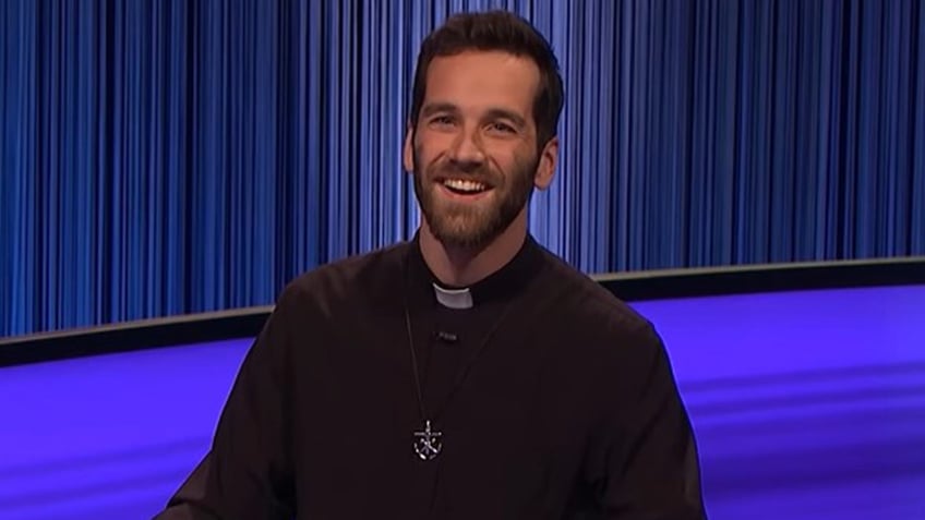 A photo of Father Steve Jakubowski on "Jeopardy!"