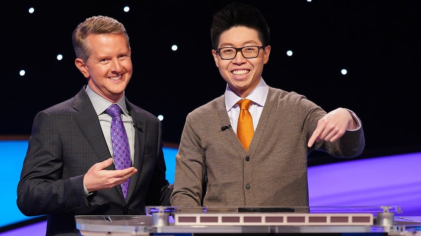 Ken Jennings and Jeopardy contestant on the show