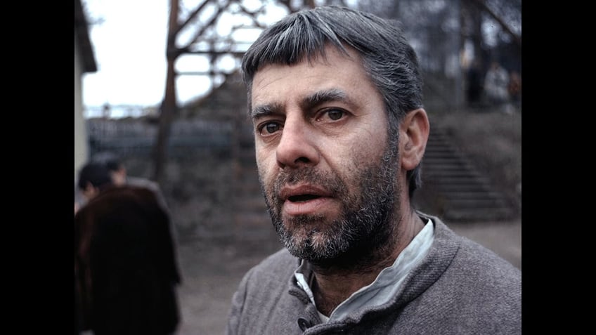 A close-up of Jerry Lewis in costume in The Day the Clown Cried looking tired.