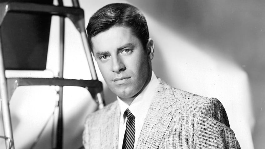 A close-up of Jerry Lewis in black and white wearing a suit.