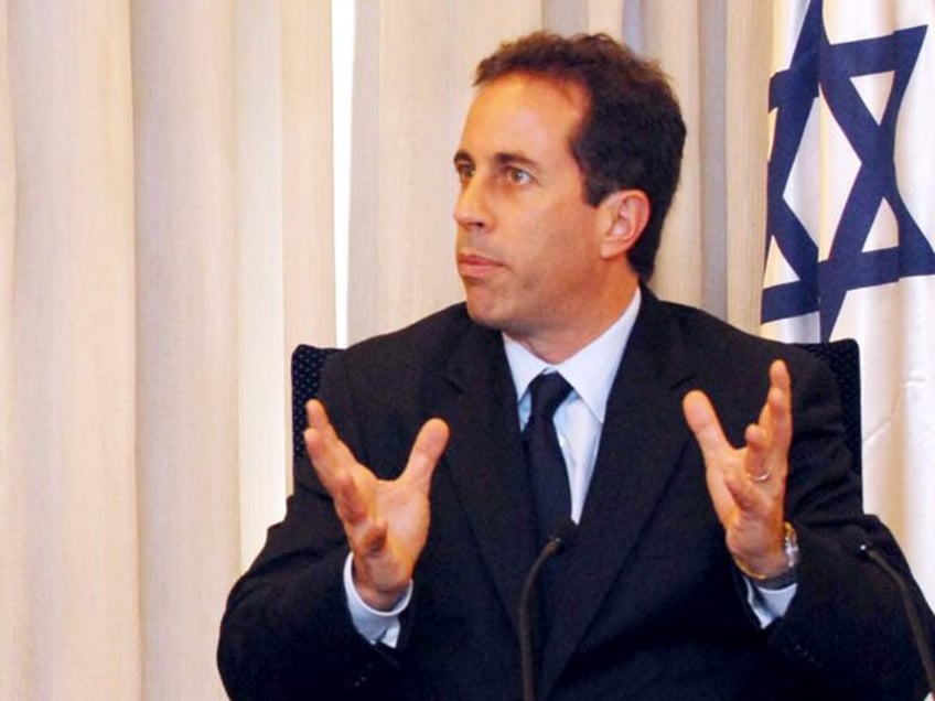 JERUSALEM, ISRAEL - NOVEMBER 23: (ISRAEL OUT) In this handout image supplied by the Israeli Government Press Office, Comedien Jerry Seinfeld talks with Israeli President Shimon Peres on November 23, 2007 in Jerusalem, Israel. (Photo by Moshe Milner/GPO/Getty IMages)