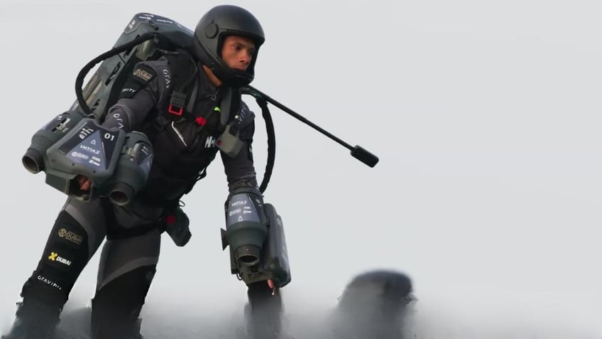 jet suit racers dot skies as real life iron man takes flight