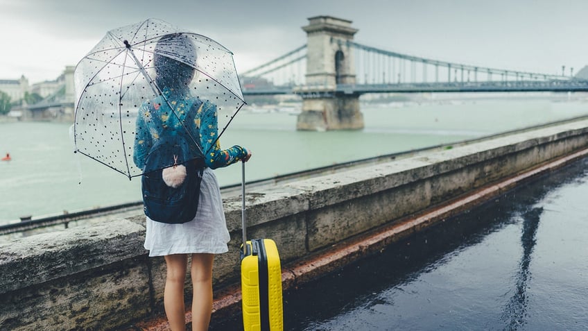 traveler caught in the rain