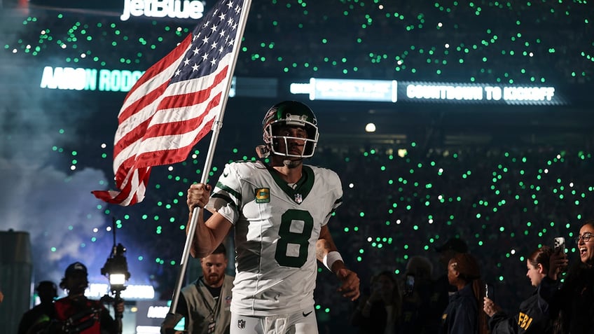 Aaron Rodgers with the American flag