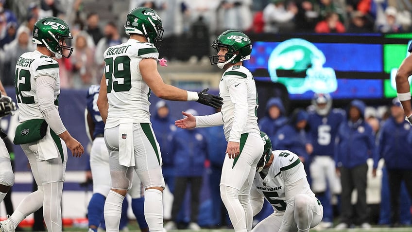 jets earn bragging rights with overtime field goal to defeat the giants