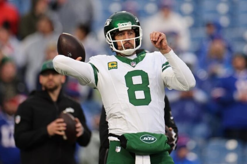 New York Jets quarterback Aaron Rodgers warms up prior to an NFL game against the Buffalo