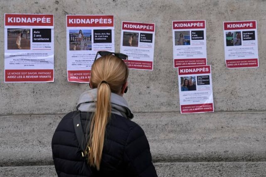 jewish students plaster paris walls with photos of french citizens believed held hostage by hamas