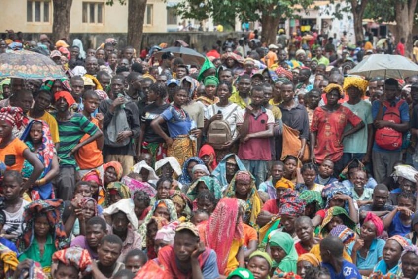 Displaced people from the province of Cabo Delgado gather to received humanitarian aid fro