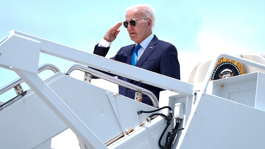 President Joe Biden boards Air Force One at Dover Air Force Base