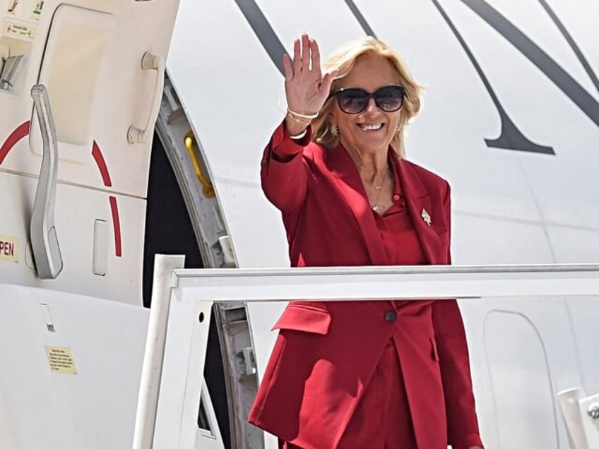 US First Lady Jill Biden waves upon arrival for the inauguration of Mexico's President-ele