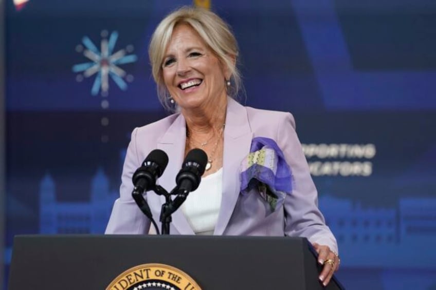 jill biden marks us reentry into unesco with a flag raising ceremony in paris