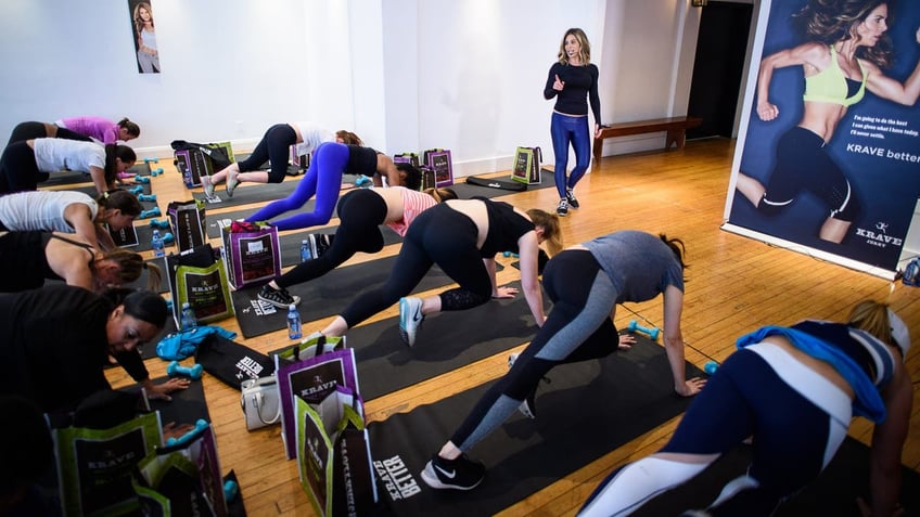 jillian michaels walking while instructing a pilates class