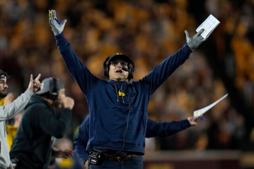 jim harbaugh leans on ted lasso to deal with challenges for no 3 michigan vs no 2 ohio state