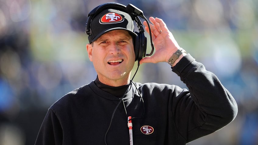 Jim Harbaugh with SF