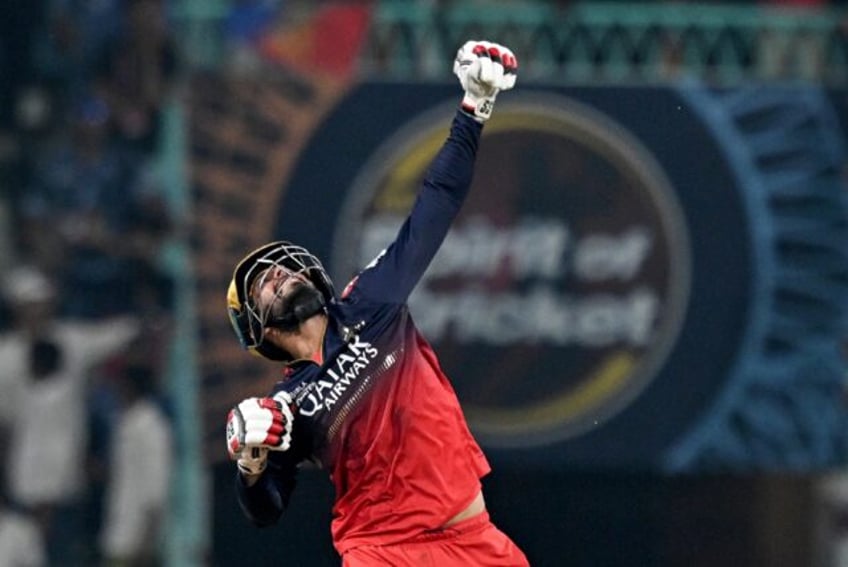 Royal Challengers Bengaluru's Jitesh Sharma celebrates his team's win against Lucknow Supe