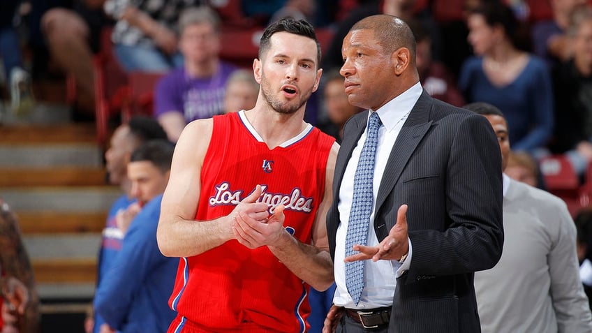 JJ Redick talks with Doc Rivers