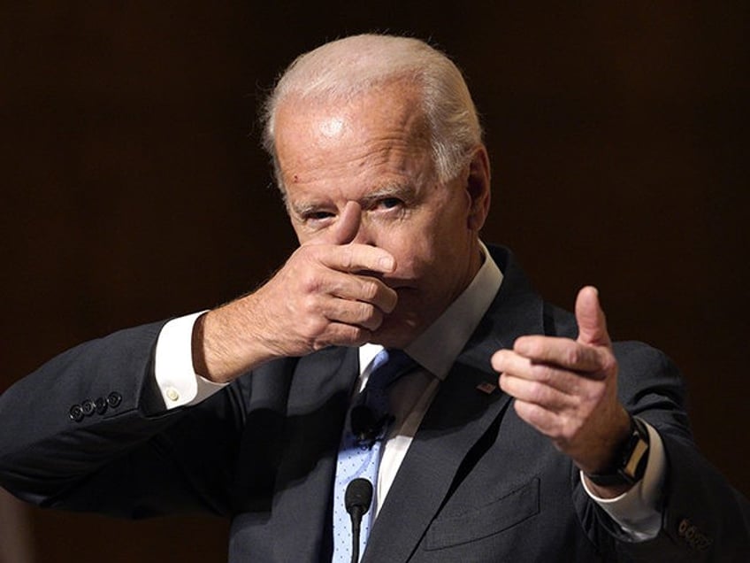 Former Vice President Joe Biden mimics shooting a gun as he speaks at the Chuck Hagel Forum in Global Leadership, on the campus of the University of Nebraska-Omaha, in Omaha, Neb., Thursday, Feb. 28, 2019. (AP Photo/Nati Harnik)