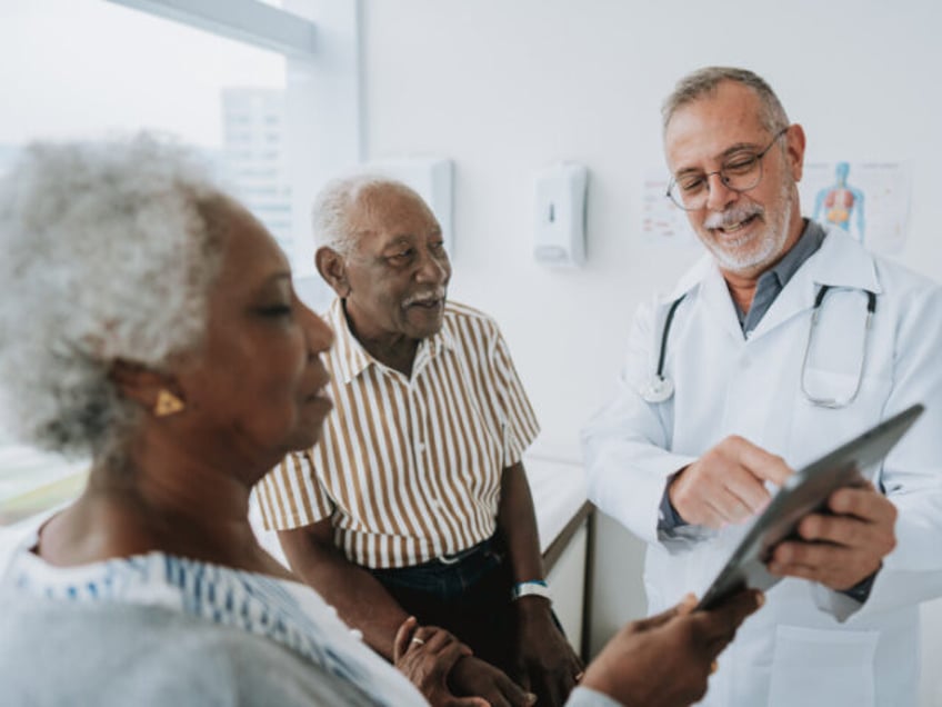 Older Couple with Doctor