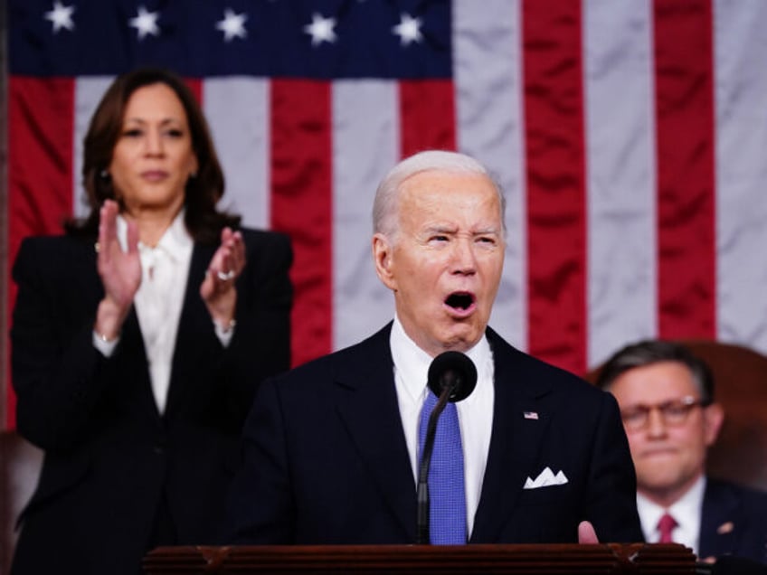 US President Joe Biden speaks during a State of the Union address at the US Capitol in Was