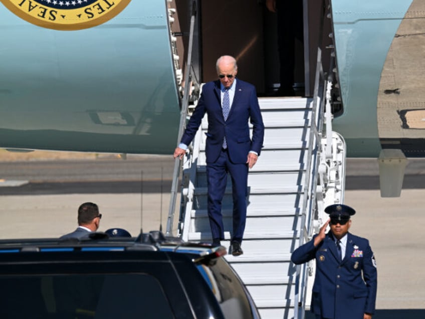 joe biden slips on stairs after report about his staff trying to keep him from tripping