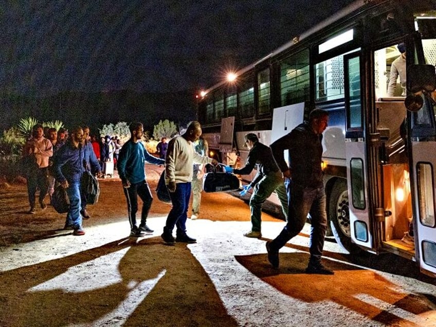 JACUMBA HOT SPRINGS, CA - JUNE 24: Migrants are processed by U.S. Border Patrol agents aft