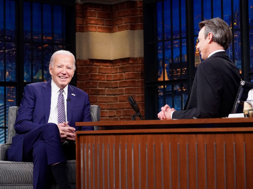 LATE NIGHT WITH SETH MEYERS -- Episode 1488 -- Pictured: (l-r) President Joe Biden talks w