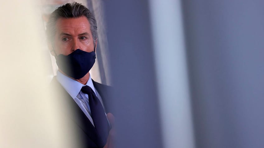 Newsom with mask on