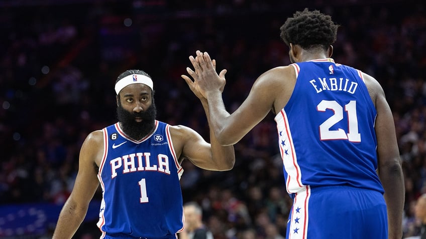 James Harden and Joel Embiid high five
