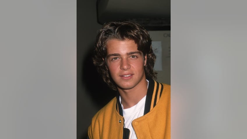 Joey Lawrence smiles in his teenage years