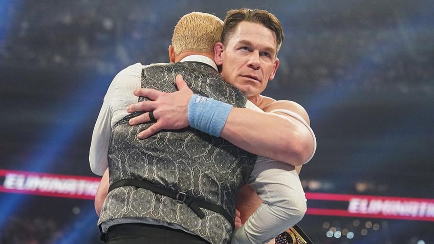 John Cena hugs Cody Rhodes