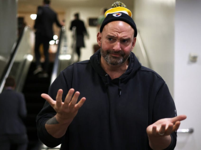 WASHINGTON, DC - NOVEMBER 15: U.S. Sen. John Fetterman (D-PA) speaks to members of the press at the U.S. Capitol on November 15, 2023 in Washington, DC. The Senate is expected to vote soon on a continuing resolution that will avoid a government shutdown after midnight on this Friday. (Photo …