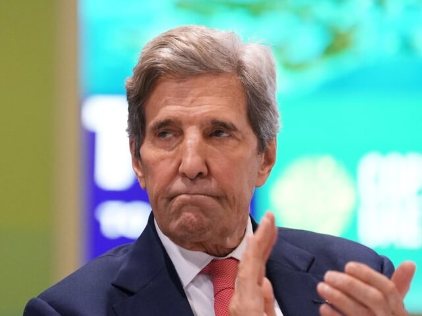 john kerry calls himself a militant and demands end to coal plants anywhere in the world