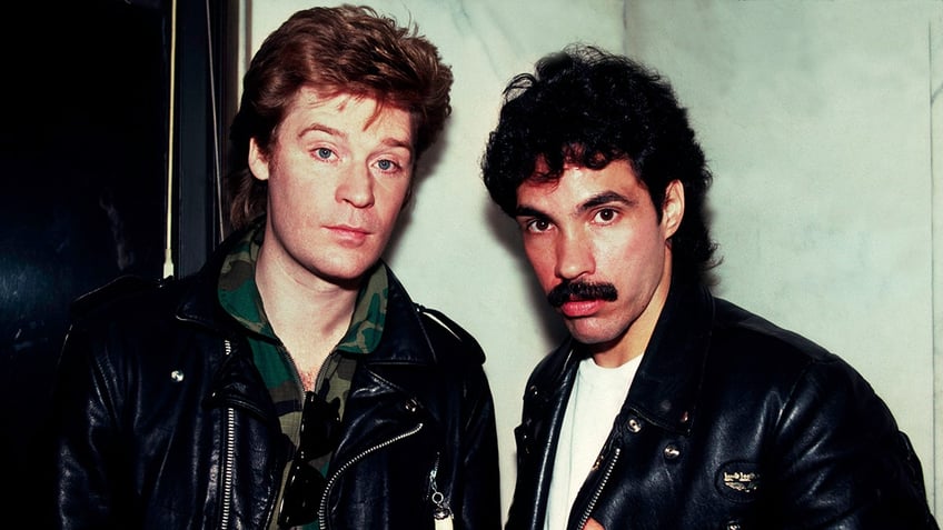 Daryl Hall and John Oates posing together in the 1980s