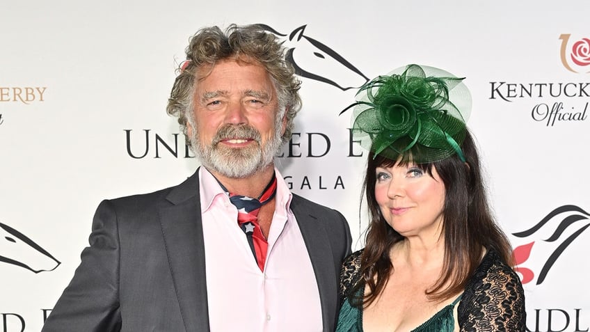 Actor John Schneider walks red carpet with Dee Dee Sorvino