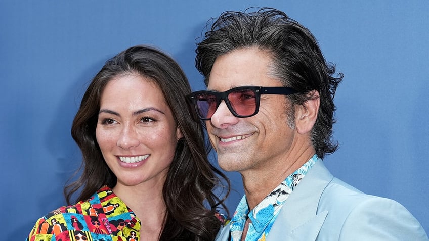 John Stamos with wife Caitlin