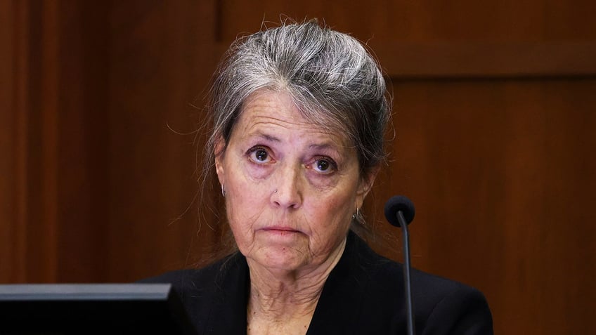 Christi Dembrowski testifying in a courtroom.