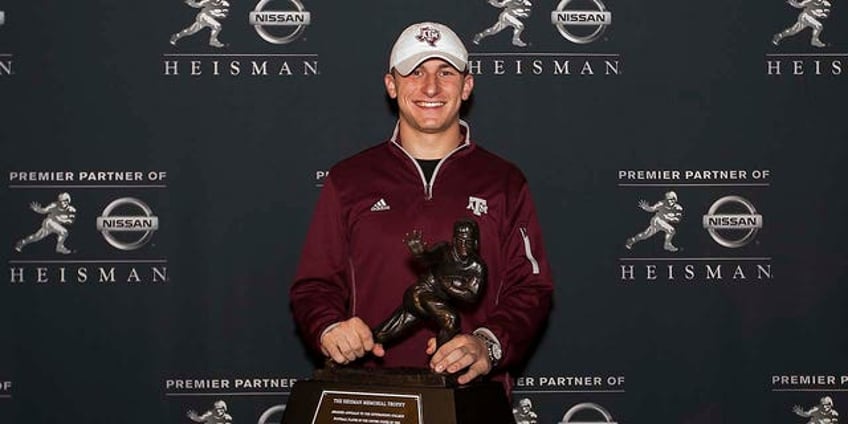 johnny manziel rips ncaa over refusal to return reggie bushs heisman trophy