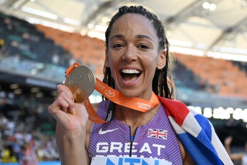 johnson thompson puts injuries behind her to win heptathlon world gold