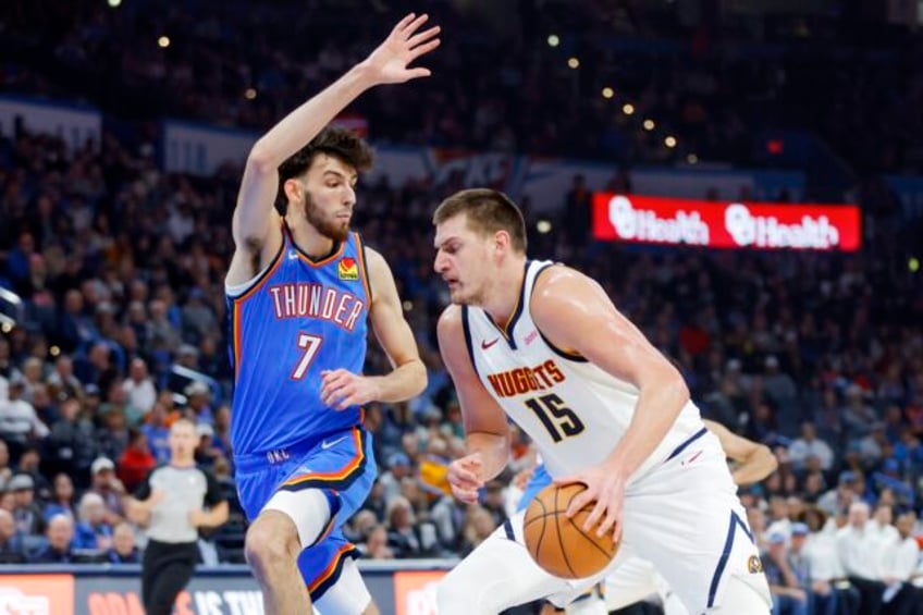 jokics 28 points lead nuggets past thunder 128 95 in holmgrens 1st regular season home game