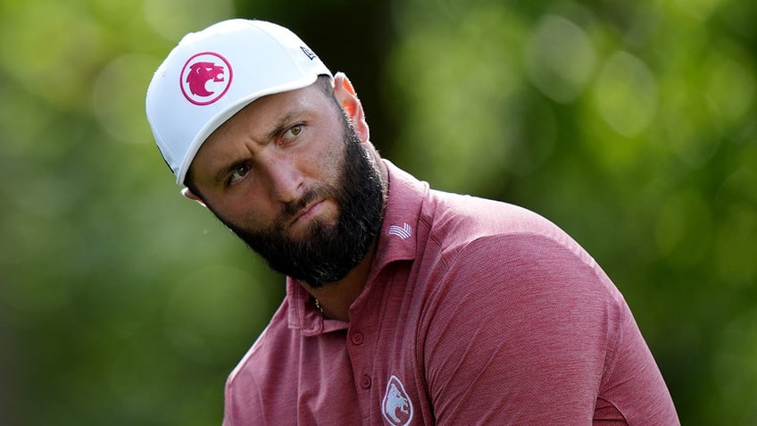 Jon Rahm looks on course