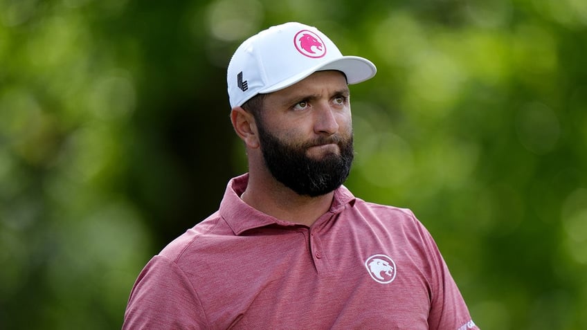 Jon Rahm looks on course